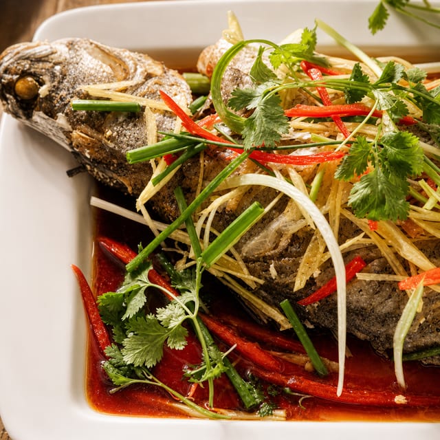 Cá Hấp Hành Gừng - Fish on the Steamboat.